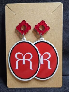Ruby Ribbon Drop Earrings with White Logo Accent